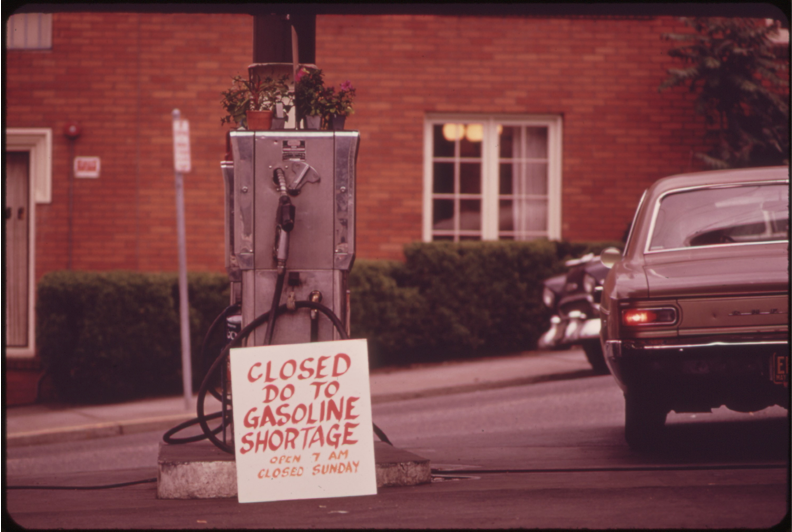 A sign reading 'Closed do to gasoline shortage.'
